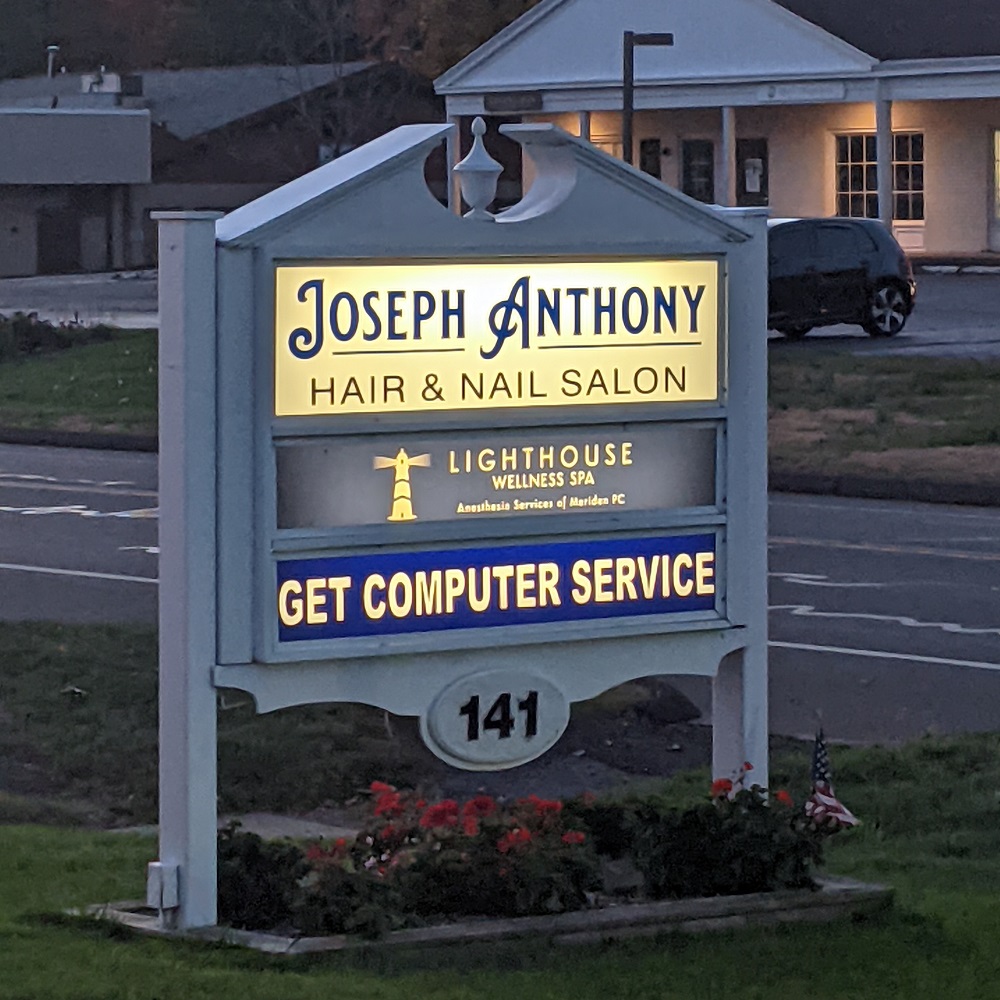 Get Computer Service sign at night